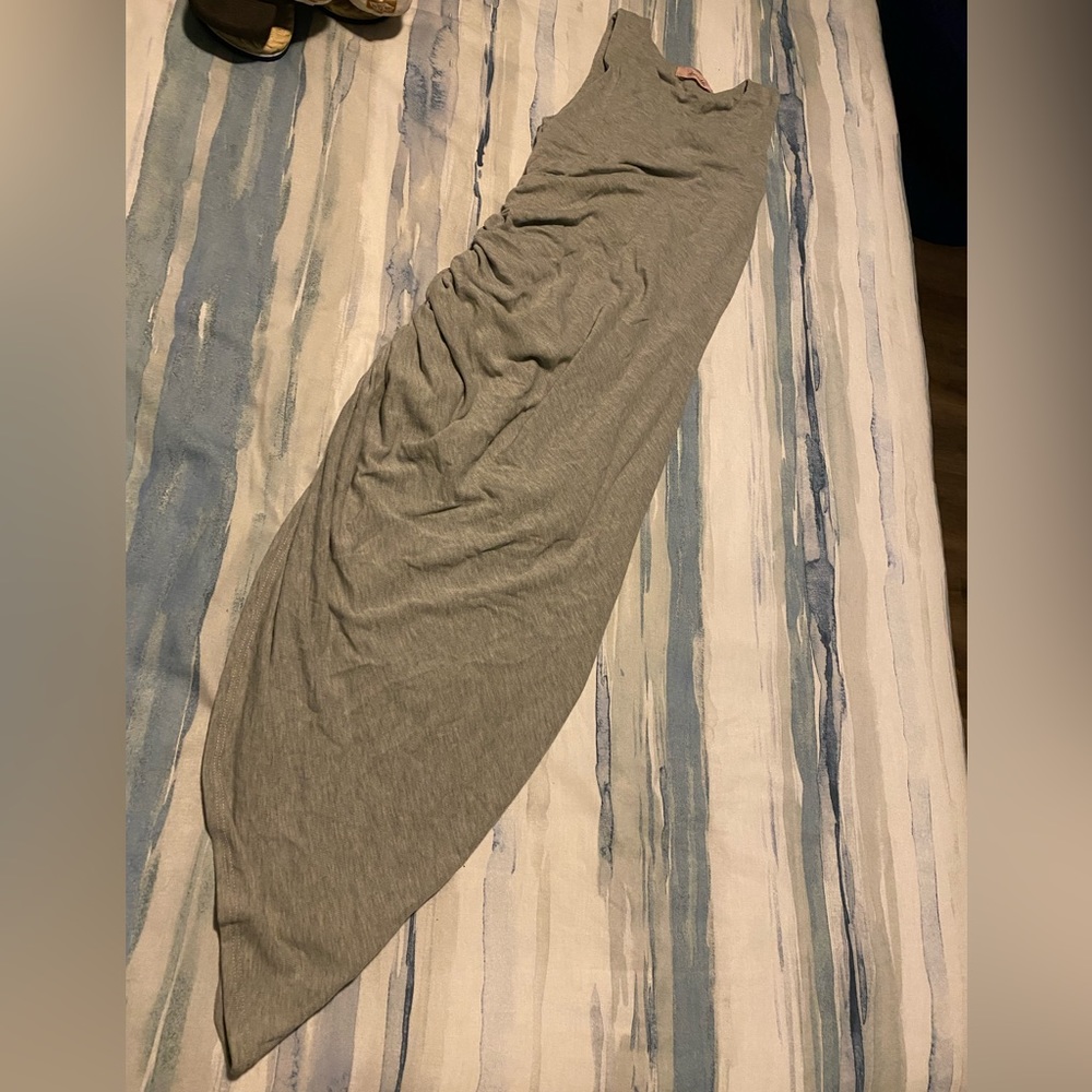 Saved by the dress boutique. Grey dress with side slit